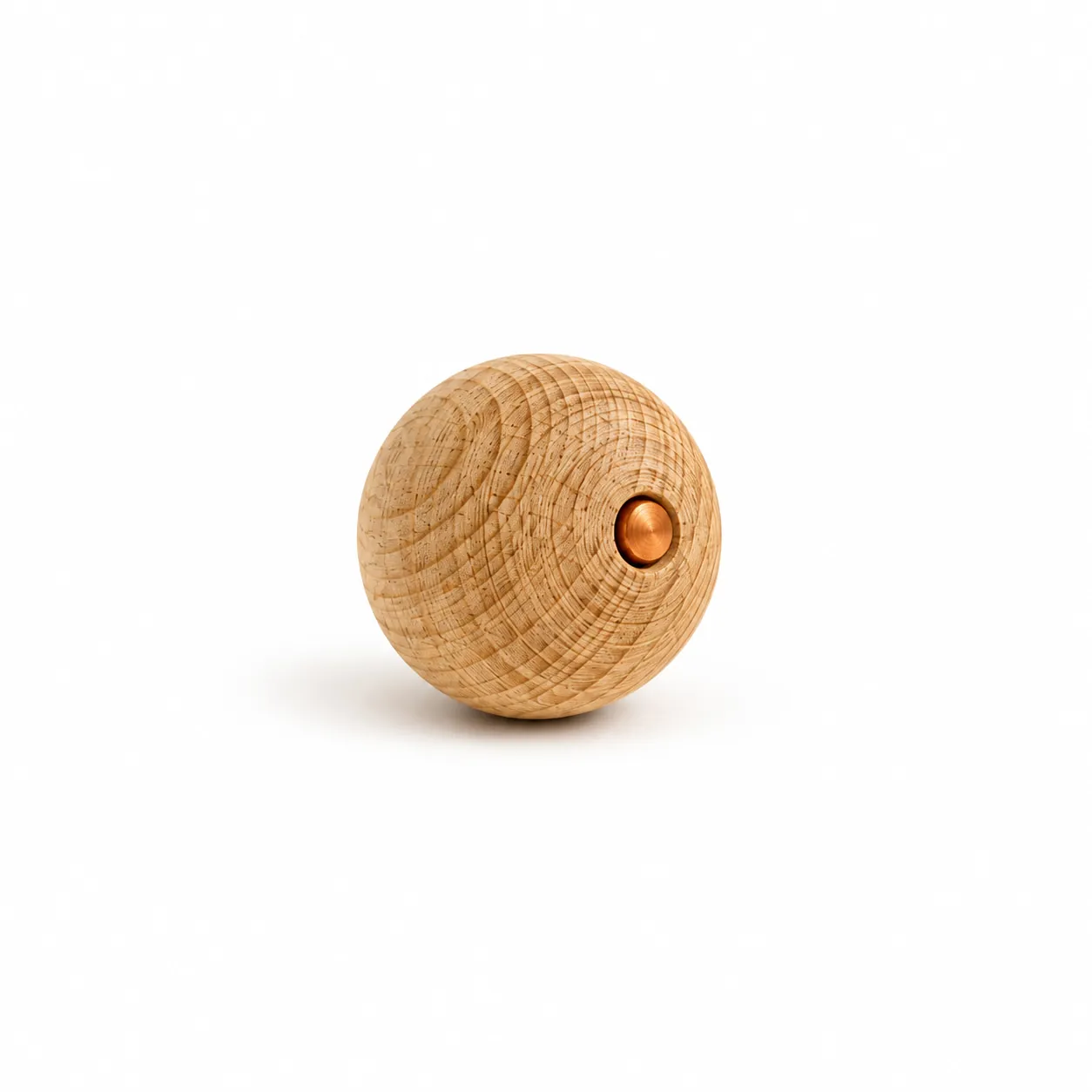 The whole ball: beech wood with a small pure copper core showing on the surface